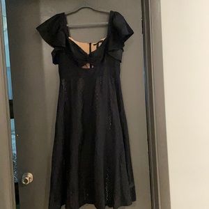 Black eyelet dress with cream underlaying. Wore once to wedding.